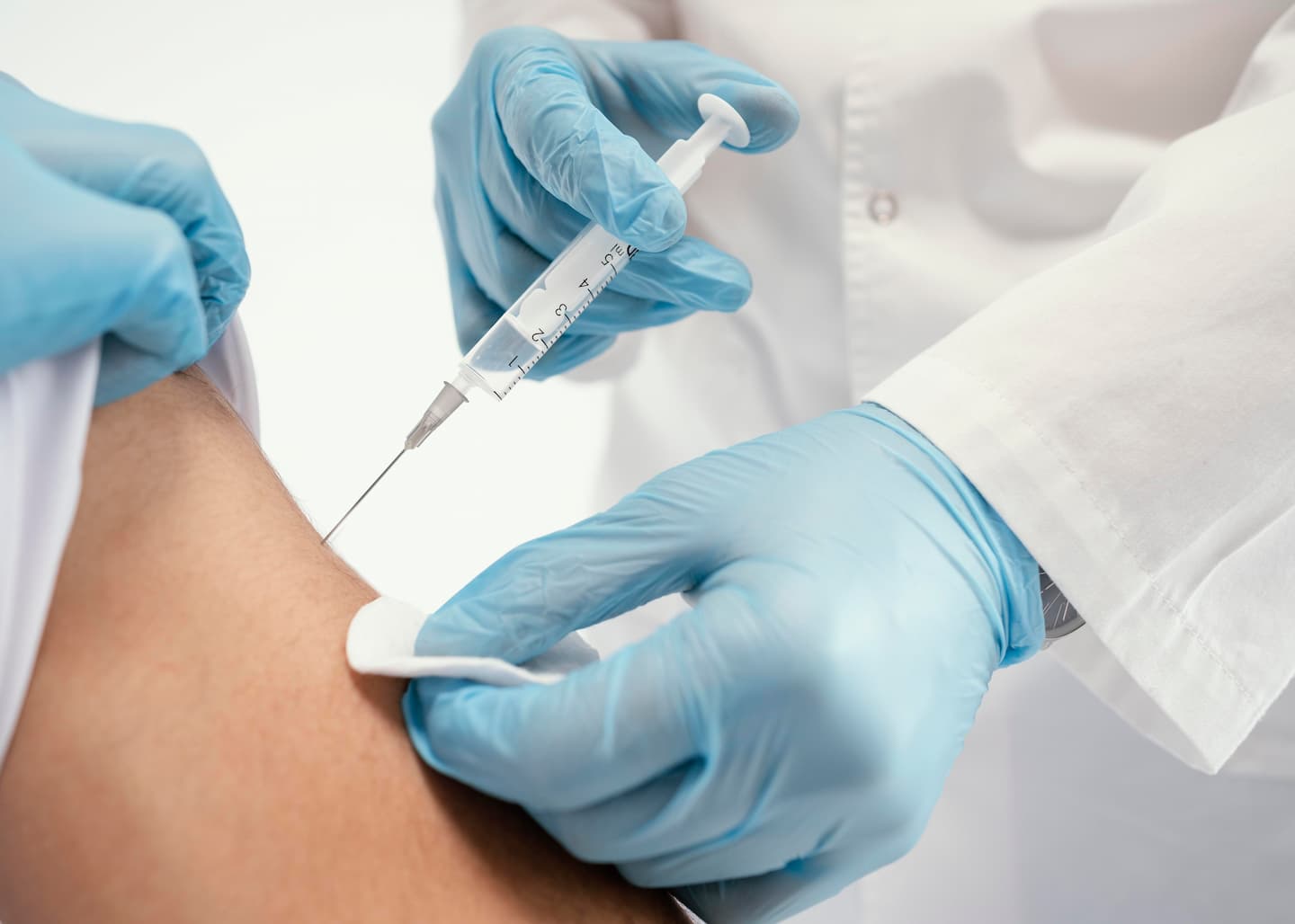 doctor vaccinating patient clinic 1