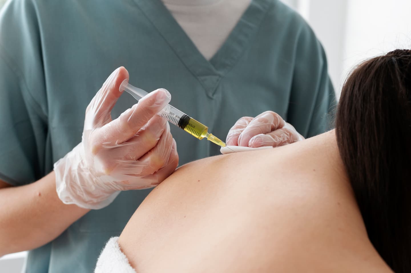 side view healthcare professional injecting neck 2 1