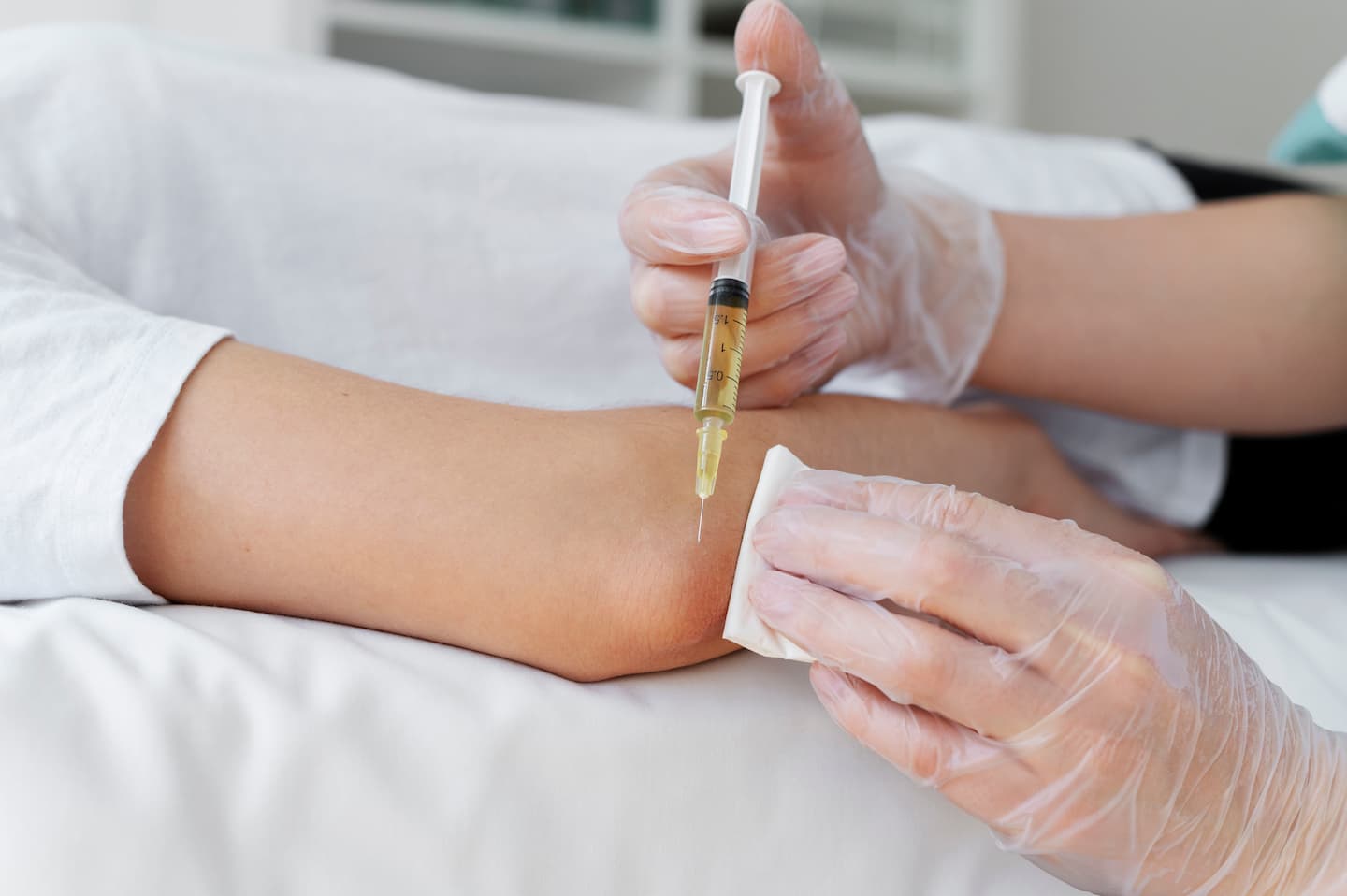 high angle patient getting elbow prp treatment 1 Prolotherapy Prolotherapy,Chiropractic Services in Hazlet,Regenerative Therapy NJ,Pain Treatment,Non-surgical pain relief Hazlet Airport Plaza Spine and Wellness