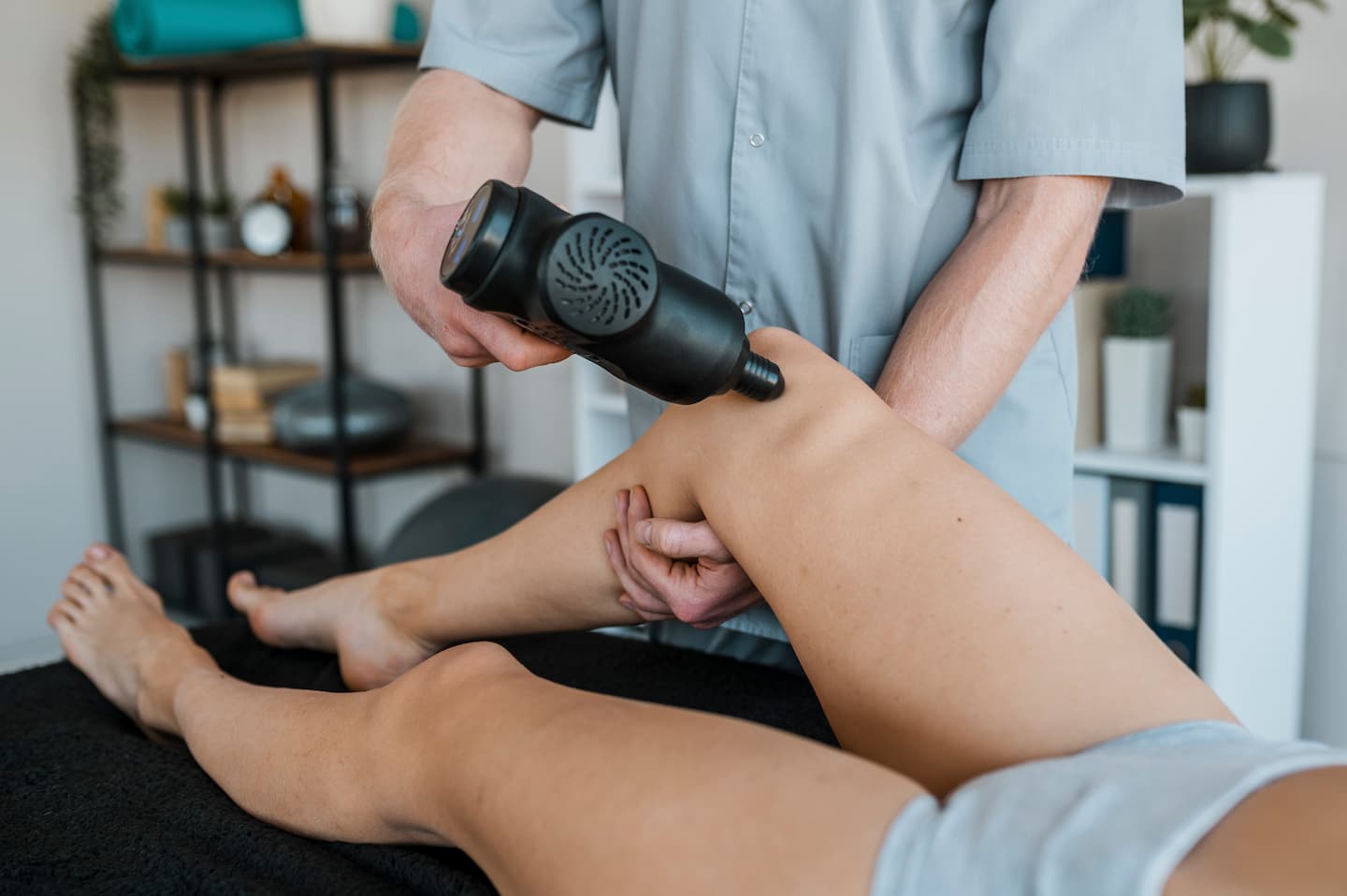 male physiotherapist using equipment female patient physical therapy session 1 Whole Body Vibration Therapy Whole Body Vibration Therapy,Chiropractic Services in Hazlet,Pain Treatment,Muscle Strength Therapy,Vibration Therapy Hazlet Airport Plaza Spine and Wellness